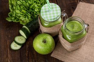 Fermented green apples in the process 
of making apple cider vinegar